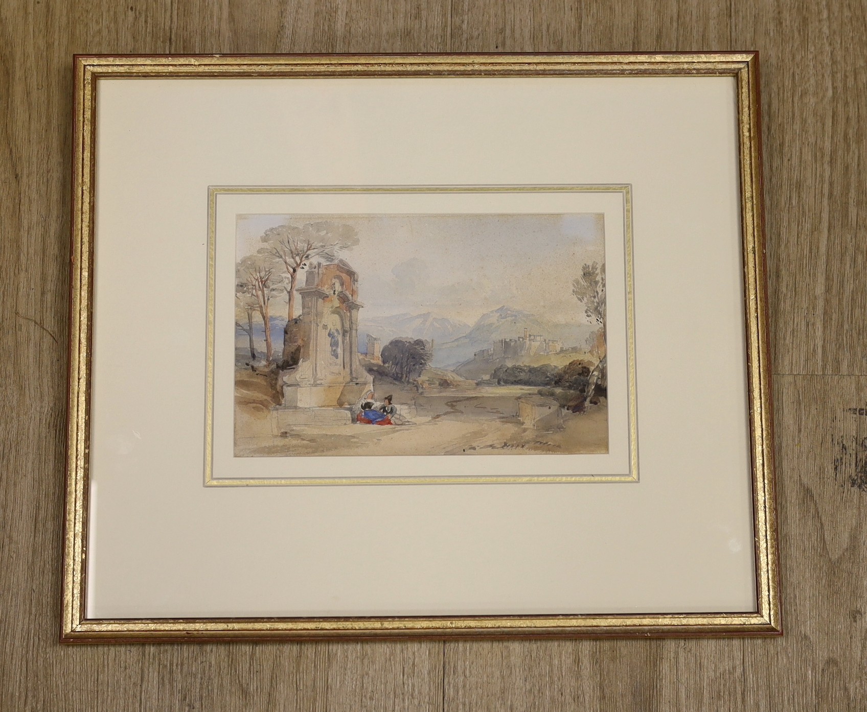 William Leighton Leitch (1804-1888), watercolour, Italianate mountainous scene, with figures resting by a classical fountain, Abbott and Holder label verso, 14.5 x 22cm